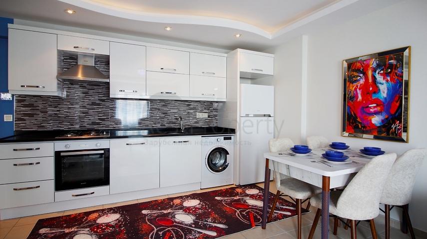 Двухкомнатная меблированная квартира в Махмутларе