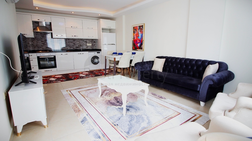 Двухкомнатная меблированная квартира в Махмутларе