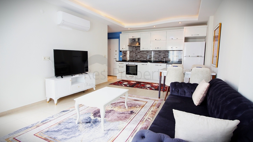 Двухкомнатная меблированная квартира в Махмутларе