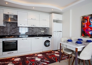 Двухкомнатная меблированная квартира в Махмутларе