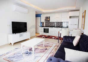 Двухкомнатная меблированная квартира в Махмутларе