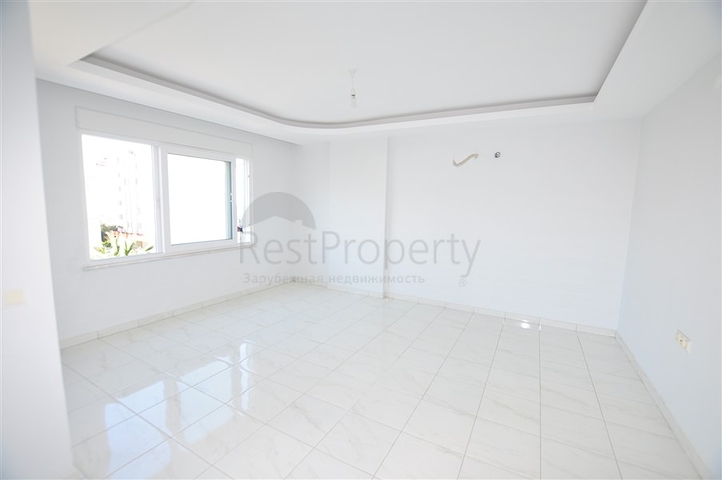 Квартира планировкой 2+1 в районе Махмутлар