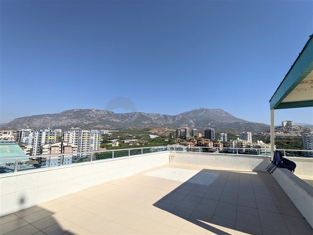 Квартира планировкой 2+1 в районе Махмутлар