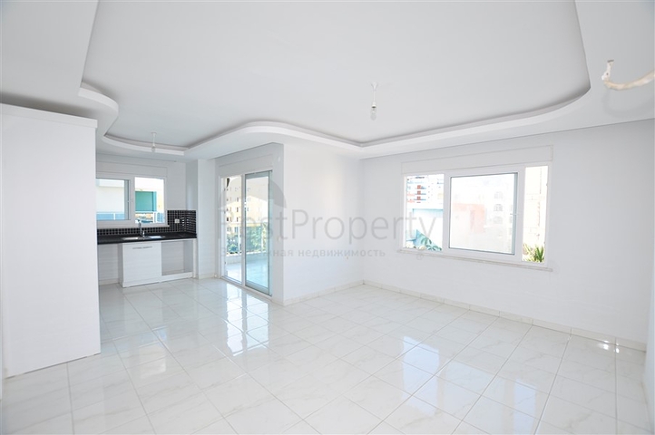 Квартира планировкой 2+1 в районе Махмутлар