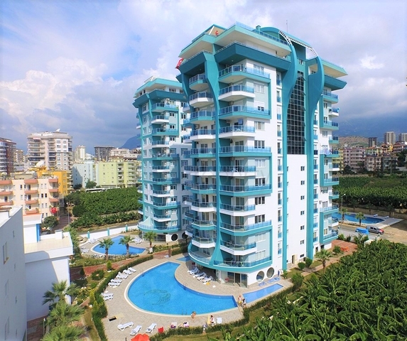 Квартира планировкой 2+1 в районе Махмутлар