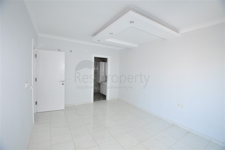 Квартира планировкой 2+1 в районе Махмутлар