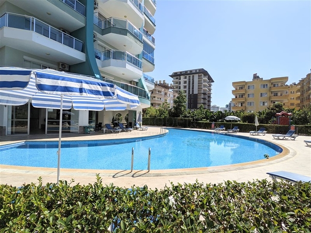 Квартира планировкой 2+1 в районе Махмутлар