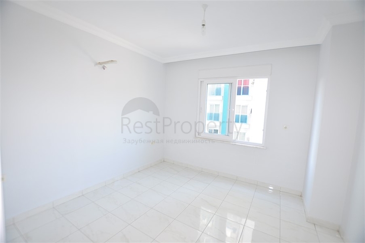 Квартира планировкой 2+1 в районе Махмутлар