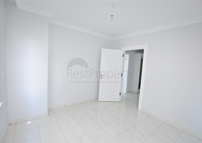 Квартира планировкой 2+1 в районе Махмутлар