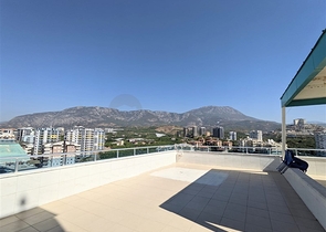 Квартира планировкой 2+1 в районе Махмутлар