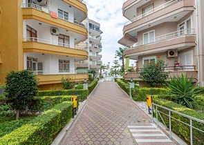 Семейная квартира в 100 метрах до моря в районе Махмутлар