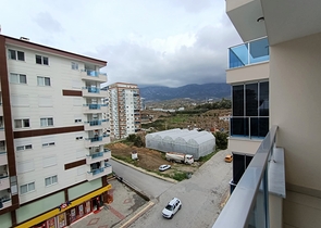 Квартира 1+1 в районе Махмутлар