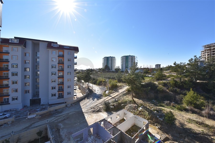 Квартира в Авсалларе с качественной чистовой отделкой в комплексе с инфраструктурой