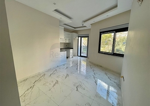 Квартира планировкой 1+1 в центре Алании