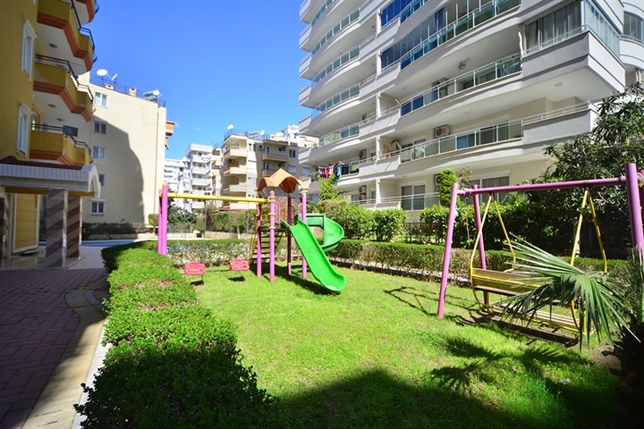 Трехкомнатная квартира в районе Махмутлар