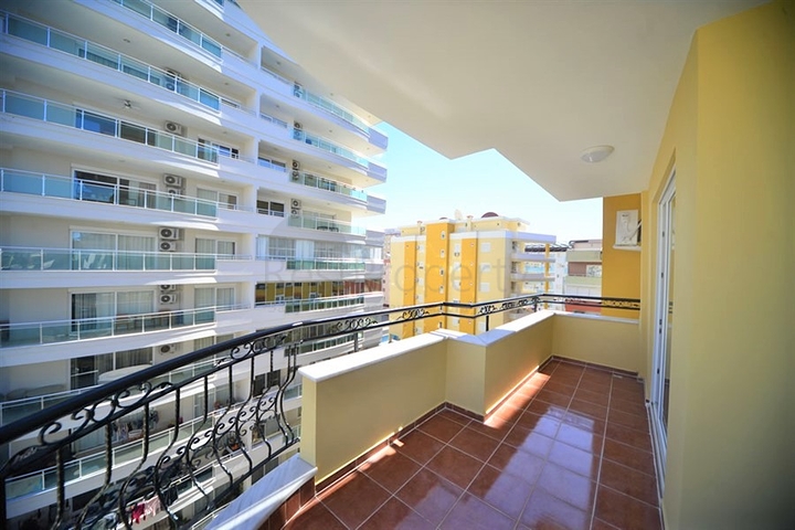 Трехкомнатная квартира в районе Махмутлар