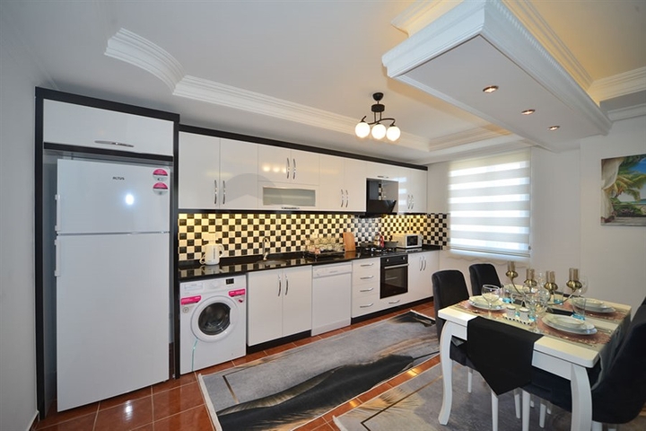 Трехкомнатная квартира в районе Махмутлар