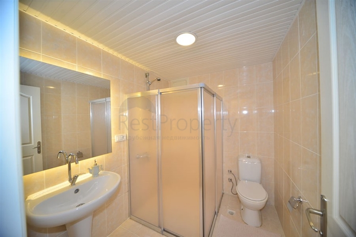 Трехкомнатная квартира в районе Махмутлар