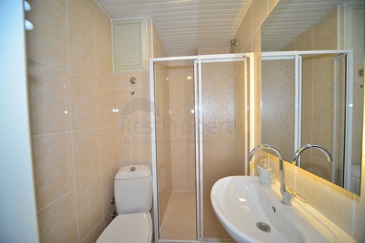 Трехкомнатная квартира в районе Махмутлар