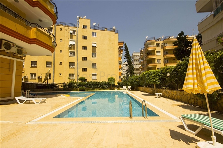 Трехкомнатная квартира в районе Махмутлар