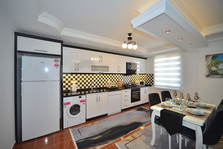 Трехкомнатная квартира в районе Махмутлар