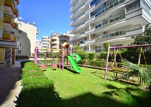 Трехкомнатная квартира в районе Махмутлар