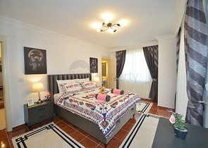 Трехкомнатная квартира в районе Махмутлар