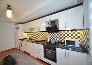 Трехкомнатная квартира в районе Махмутлар