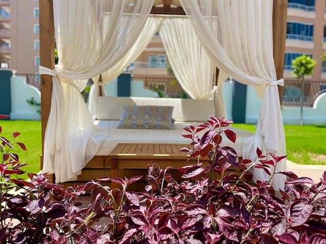 Меблированная квартира 2+1 в новом комплексе в Махмутларе