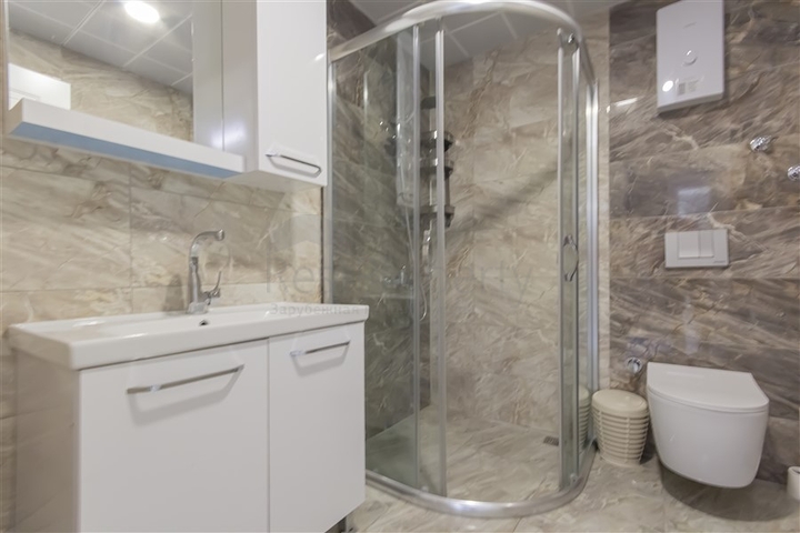 Квартира планировкой 2+1 в районе Махмутлар