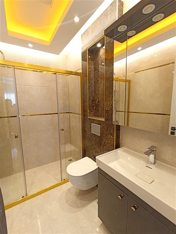 Трехкомнатная квартира в районе Махмутлар