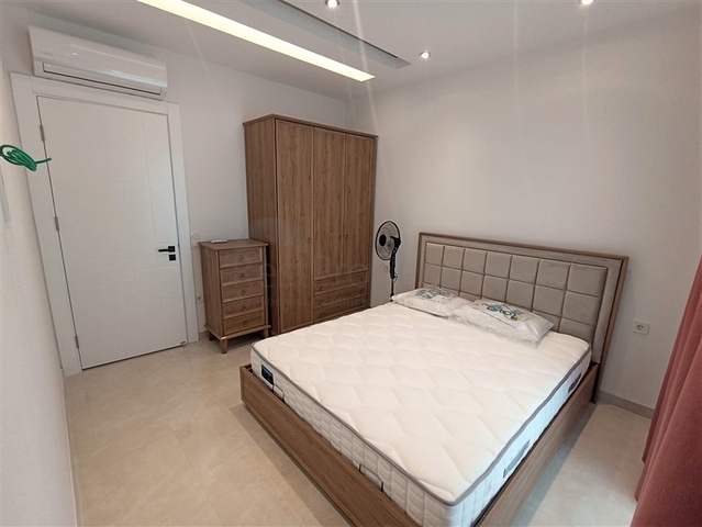 Трехкомнатная квартира в районе Махмутлар