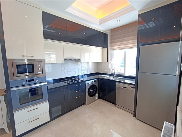 Трехкомнатная квартира в районе Махмутлар