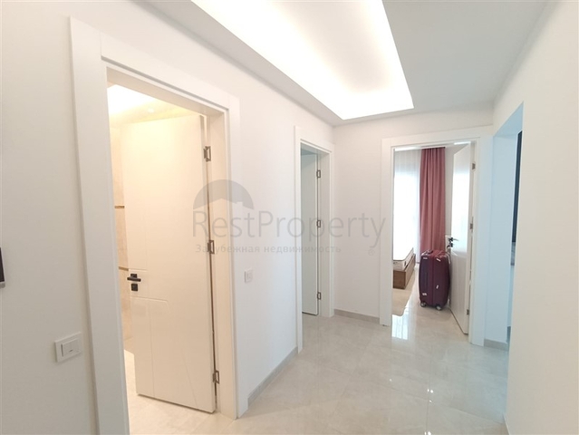 Трехкомнатная квартира в районе Махмутлар