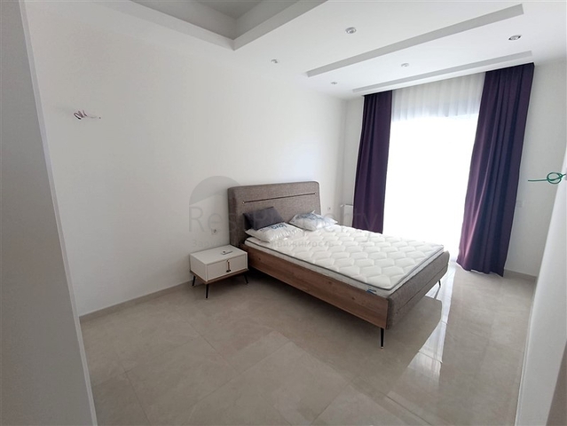 Трехкомнатная квартира в районе Махмутлар