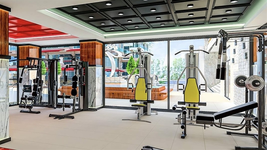 Трехкомнатная квартира в районе Махмутлар