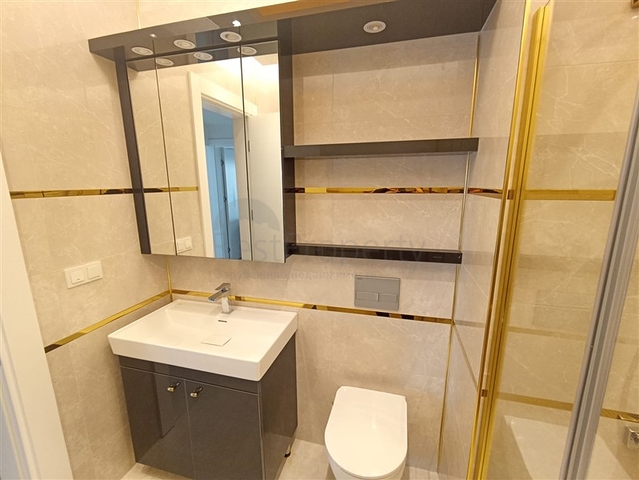 Трехкомнатная квартира в районе Махмутлар