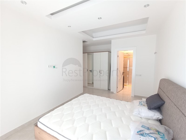 Трехкомнатная квартира в районе Махмутлар