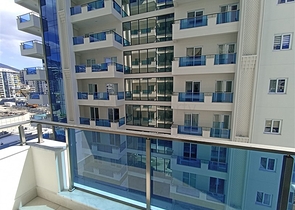 Трехкомнатная квартира в районе Махмутлар