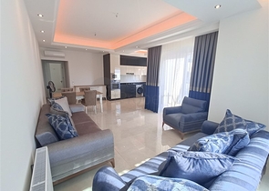 Трехкомнатная квартира в районе Махмутлар