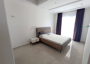 Трехкомнатная квартира в районе Махмутлар