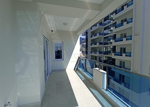 Трехкомнатная квартира в районе Махмутлар