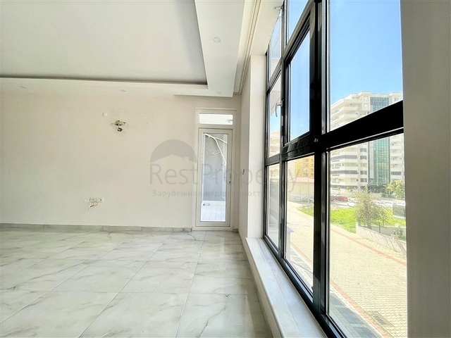 Просторная новая двухкомнатная квартира в Махмутларе