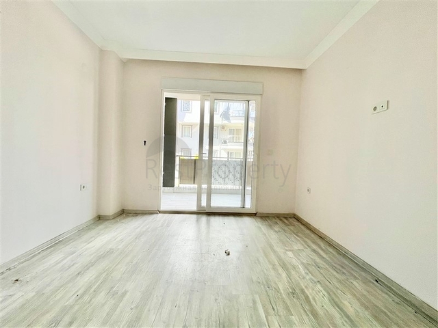 Просторная новая двухкомнатная квартира в Махмутларе