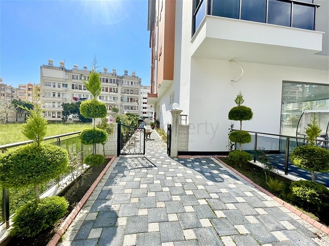 Просторная новая двухкомнатная квартира в Махмутларе