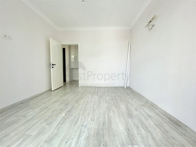 Просторная новая двухкомнатная квартира в Махмутларе