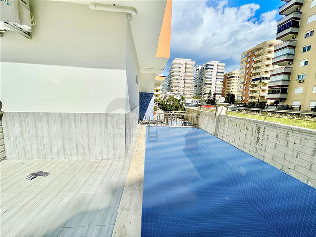 Просторная новая двухкомнатная квартира в Махмутларе