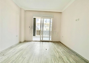 Просторная новая двухкомнатная квартира в Махмутларе