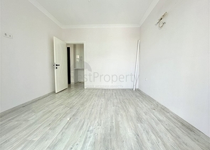 Просторная новая двухкомнатная квартира в Махмутларе