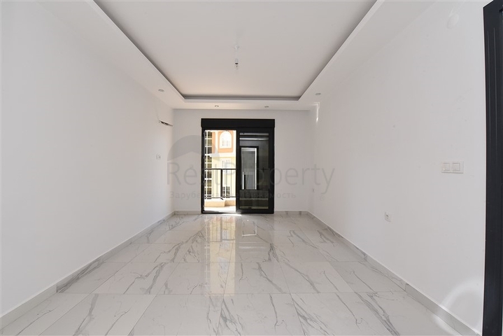 Трехкомнатная квартира в районе Махмутлар в 300 метрах от моря